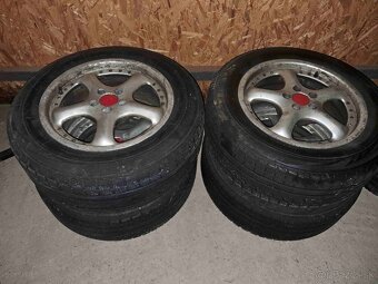 Al disky 5x100 x R16 s pneu 215x60R16 zo Subaru Forester 2x - 3