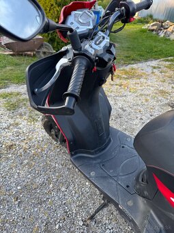Sym CROX 125 - 3