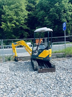 Minibager New Holland e14 Rozsirovaci podvozok - 3