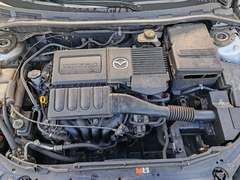 Mazda 3 1.4 benzín  62kw - 3