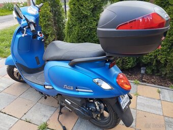 Sym 50. - 3
