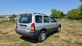 Mazda Tribute - 3