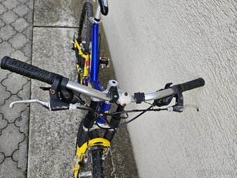 Odpruzeny bicykel genesis fst 3000 - 3