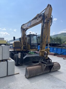 Bager CAT M315 - 3