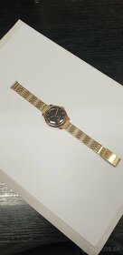 Zlaté náramkové hodinky zn. EROS - 3