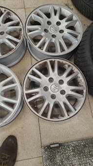 Suzuki alu disky original 15 5x114.3 - 3