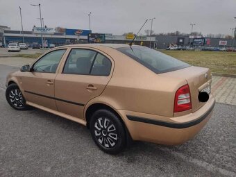 Predám Škoda Octavia 1.6i SR Elegance M5 5d S klímou - 3