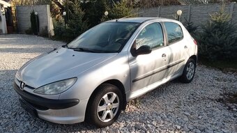 206 1.1 benzin .153000km - 3
