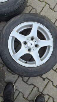 4x100R14 + 175/65R14 - 3