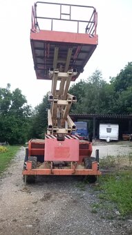 Dieselová nožnicová plošina JLG 4394RT 15m - 3