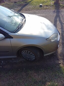 Renault laguna rok 2010 - 3