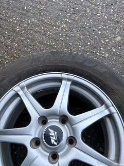 Predám sadu 4 zimných pneumatík s diskami FLW – 215/65 R16 ( - 3