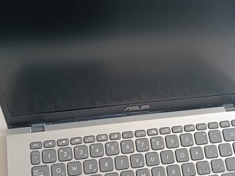 Asus M409B - 3