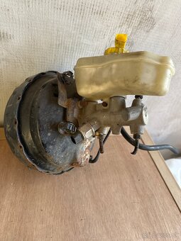 posilovač 1J2614105G - 3