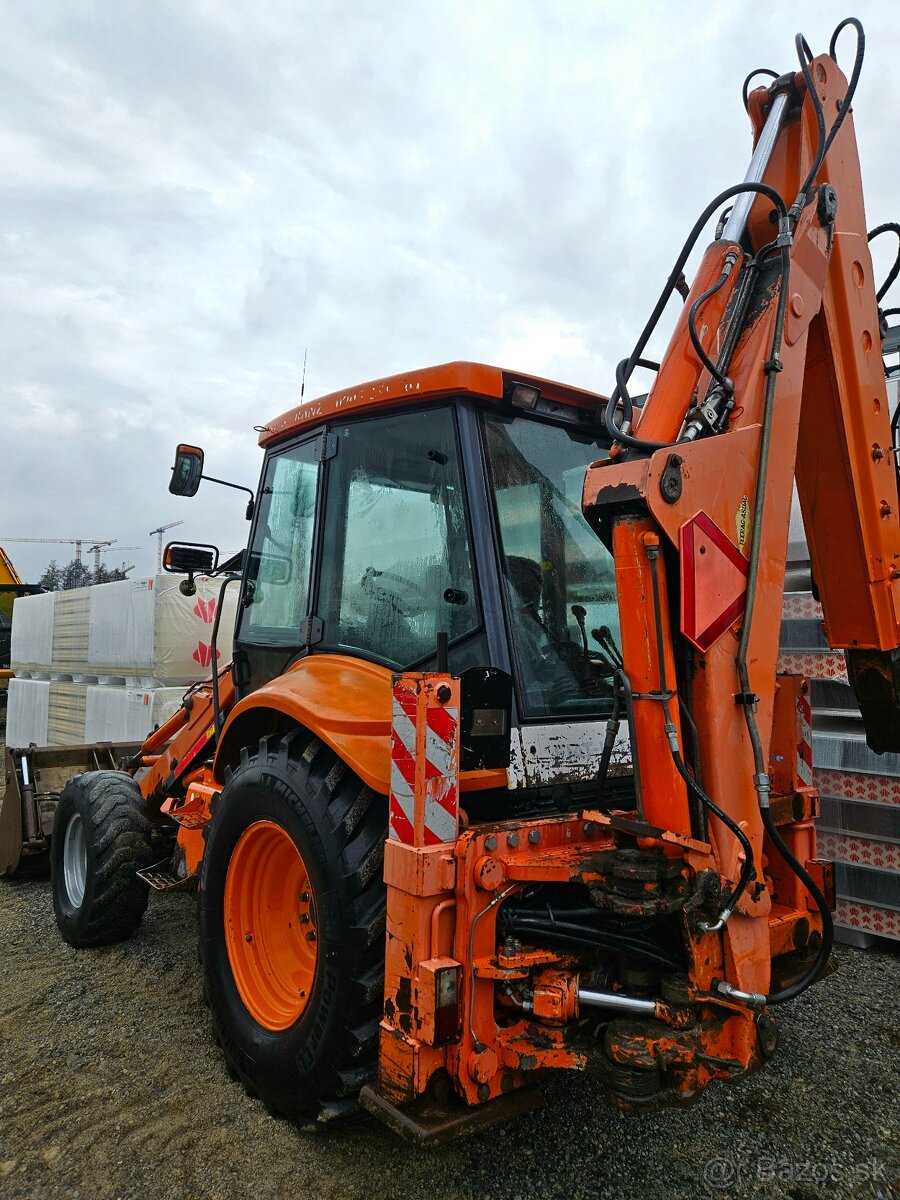 NEW HOLLAND / KOBELKO - 4