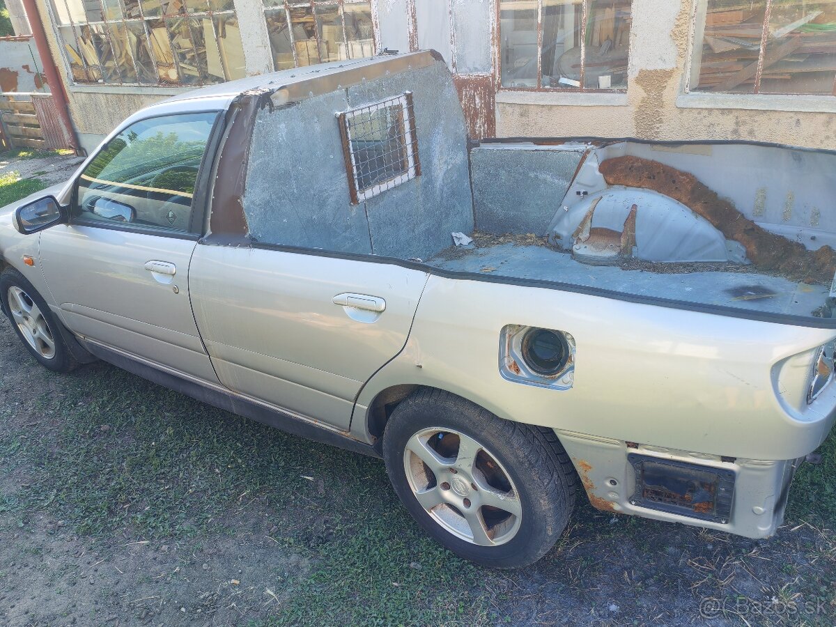 Nissan primera 2,0i - 4