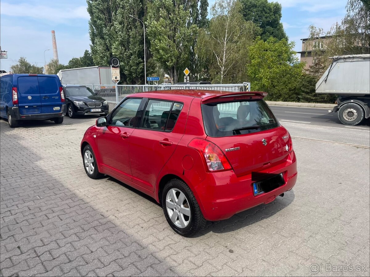 Swift .. 1.4 benzin - 4
