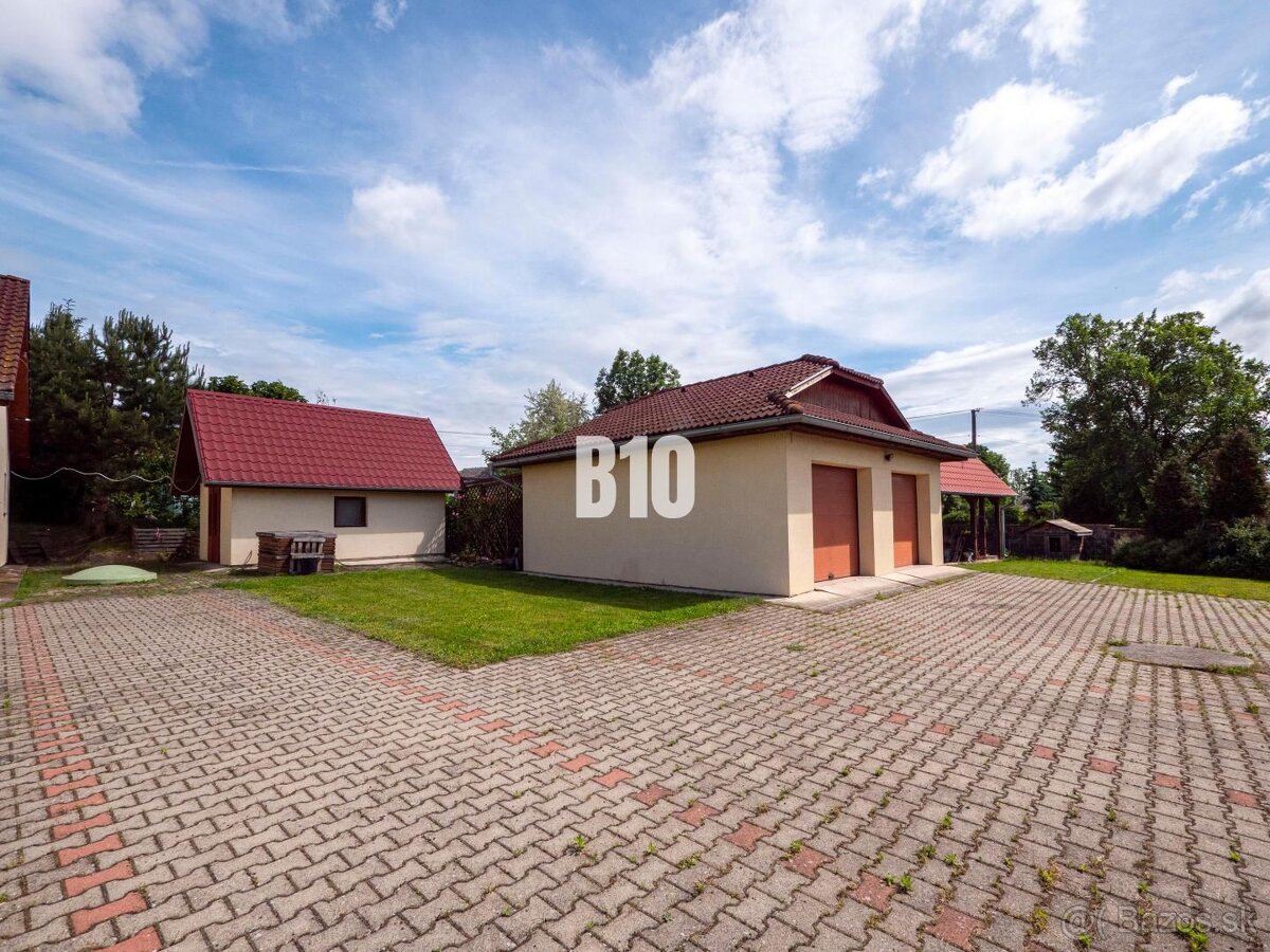 Ponuka rodinného domu s krásnym pozemkom a dvojgarážou - 4