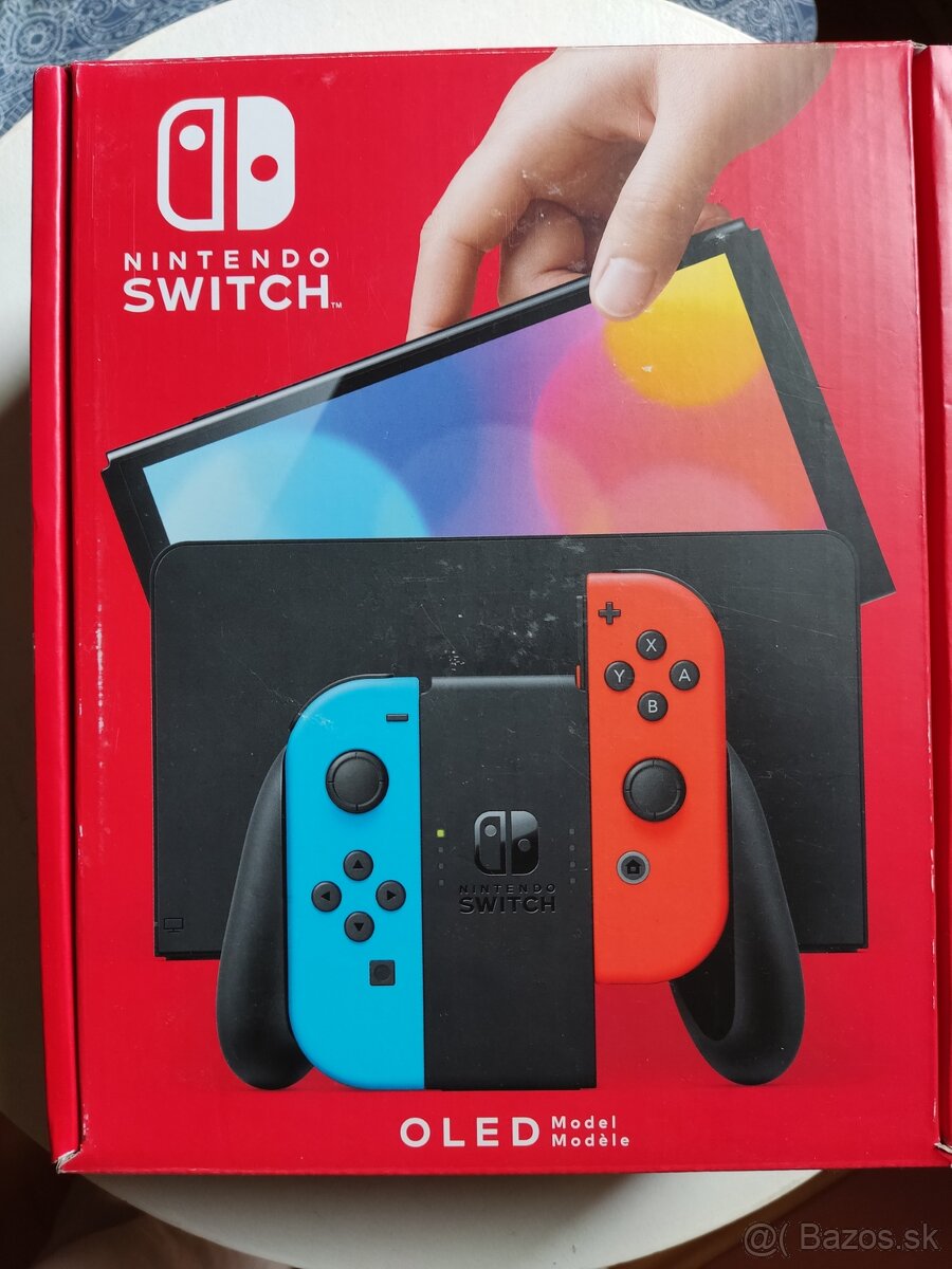 Nintendo Switch OLED + 4 hry - 4