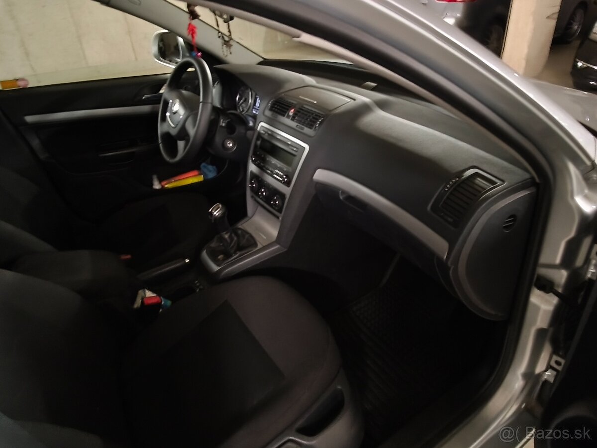 Predám Škoda OCTAVIA COMBI 1.6D77KW - 4