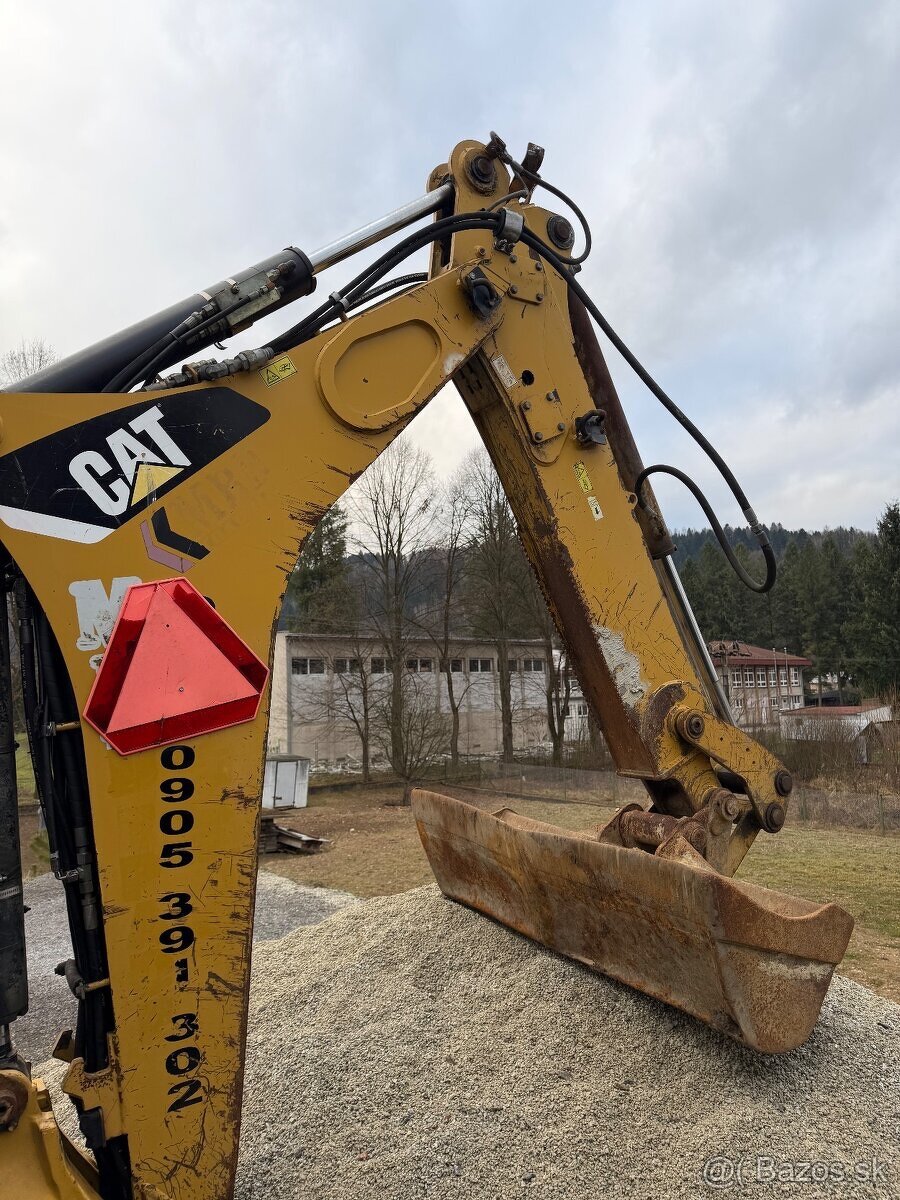 Predam Caterpilar 428E - 4