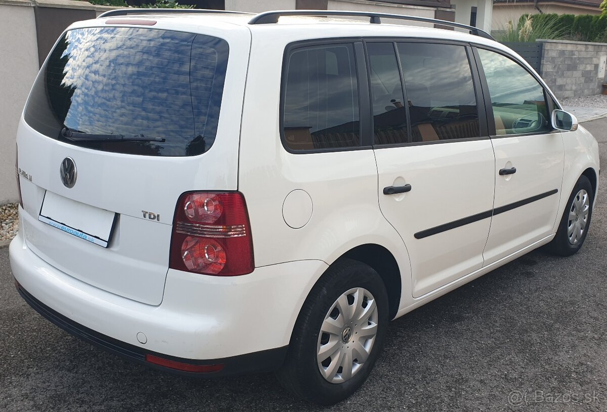 Touran - 4