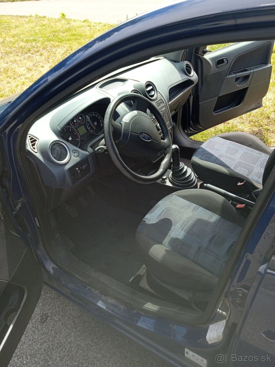 Ford Fiesta 1.4.TDI - 4