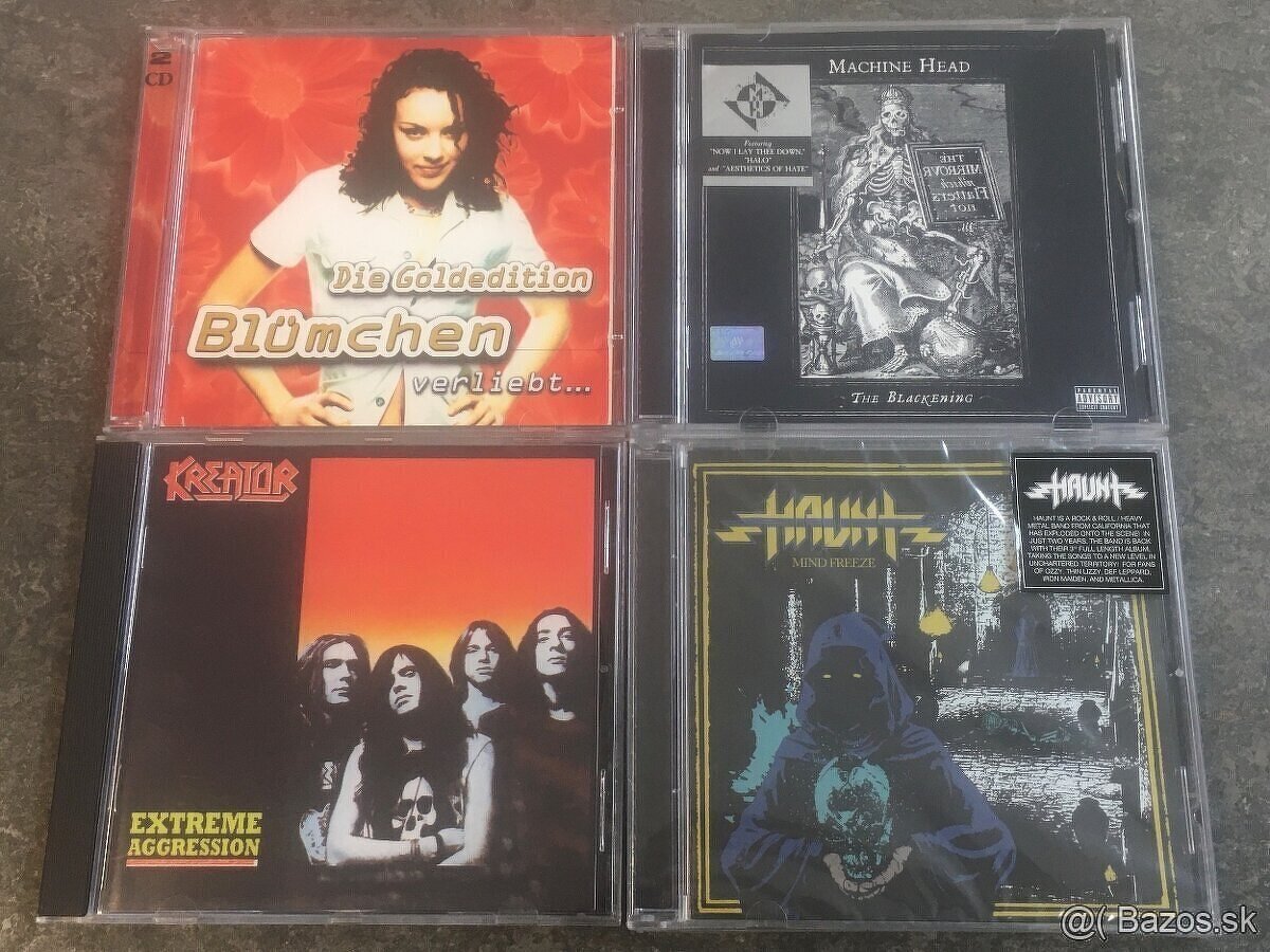 CD albumy + single - 4