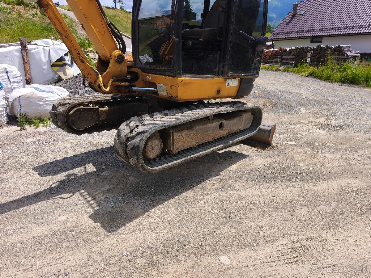 Pásový bager JCB - 4