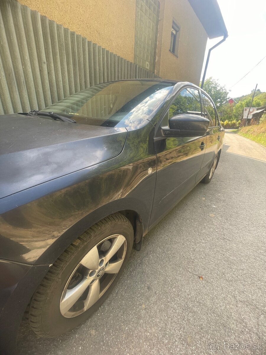 Škoda rapid 1.6Tdi - 4