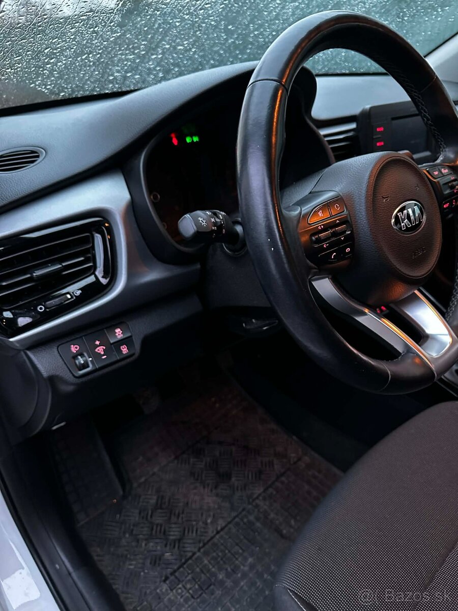 Kia rio - 4