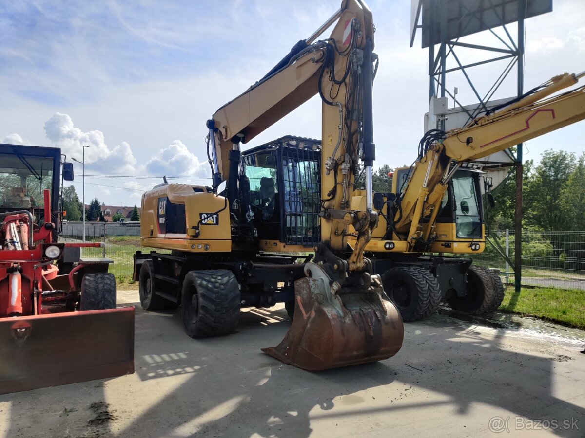 Kolový bagr CAT 318 F - 4