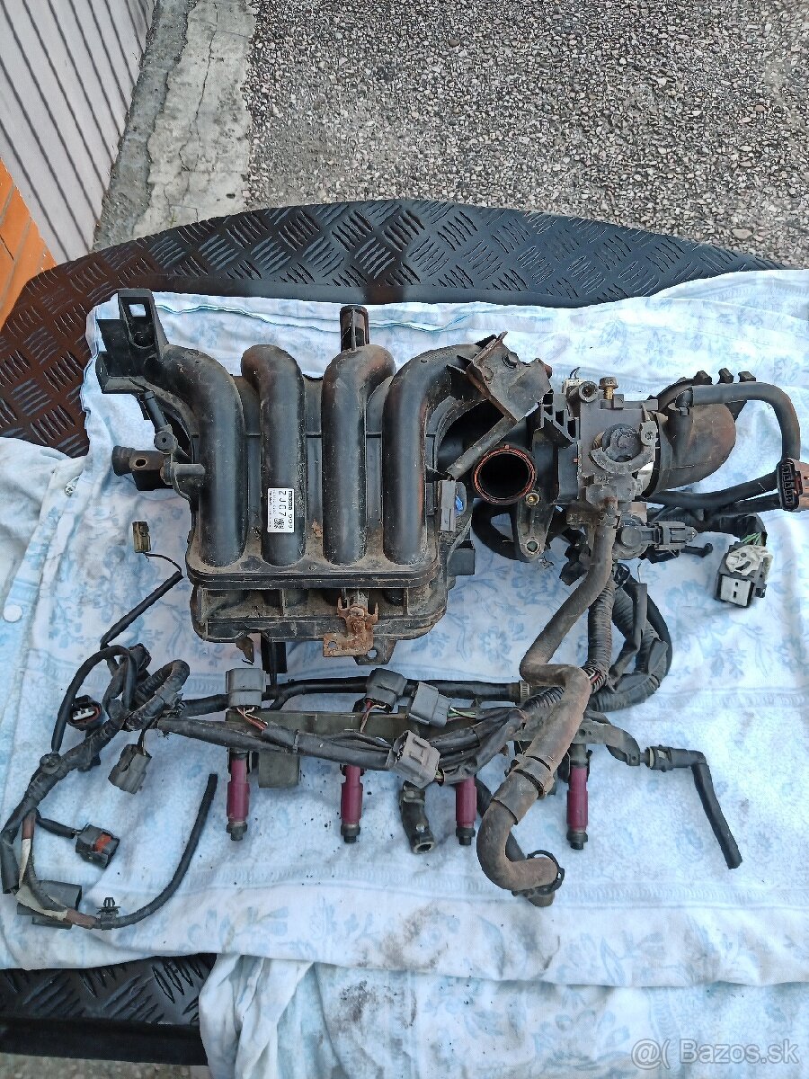 Rozpredam Mazda 3 1,4b 2004 - 4