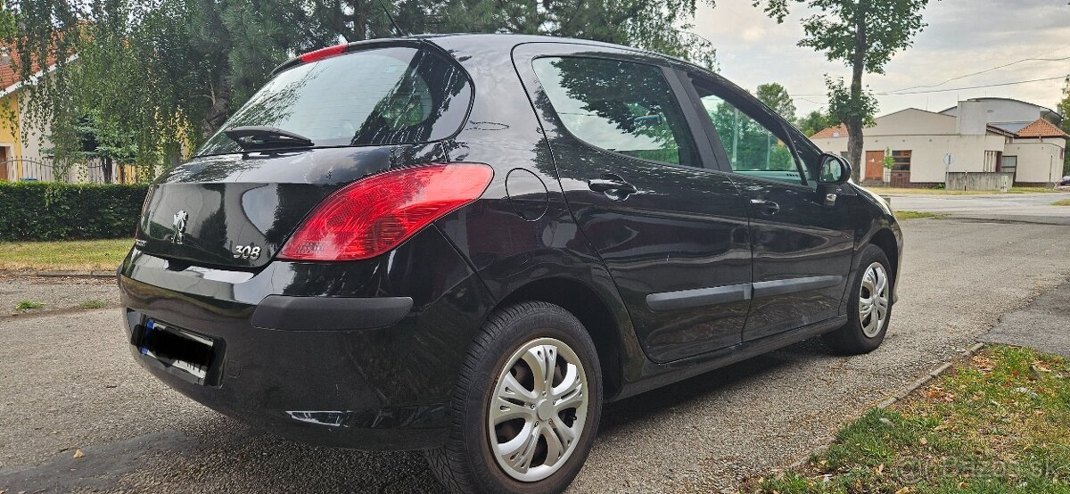 Peugeot 308 1.4i - 4