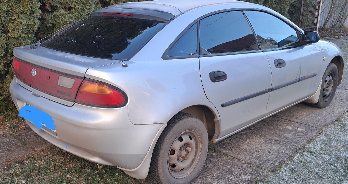 Mazda 323 F Lantis 1.5 - 4