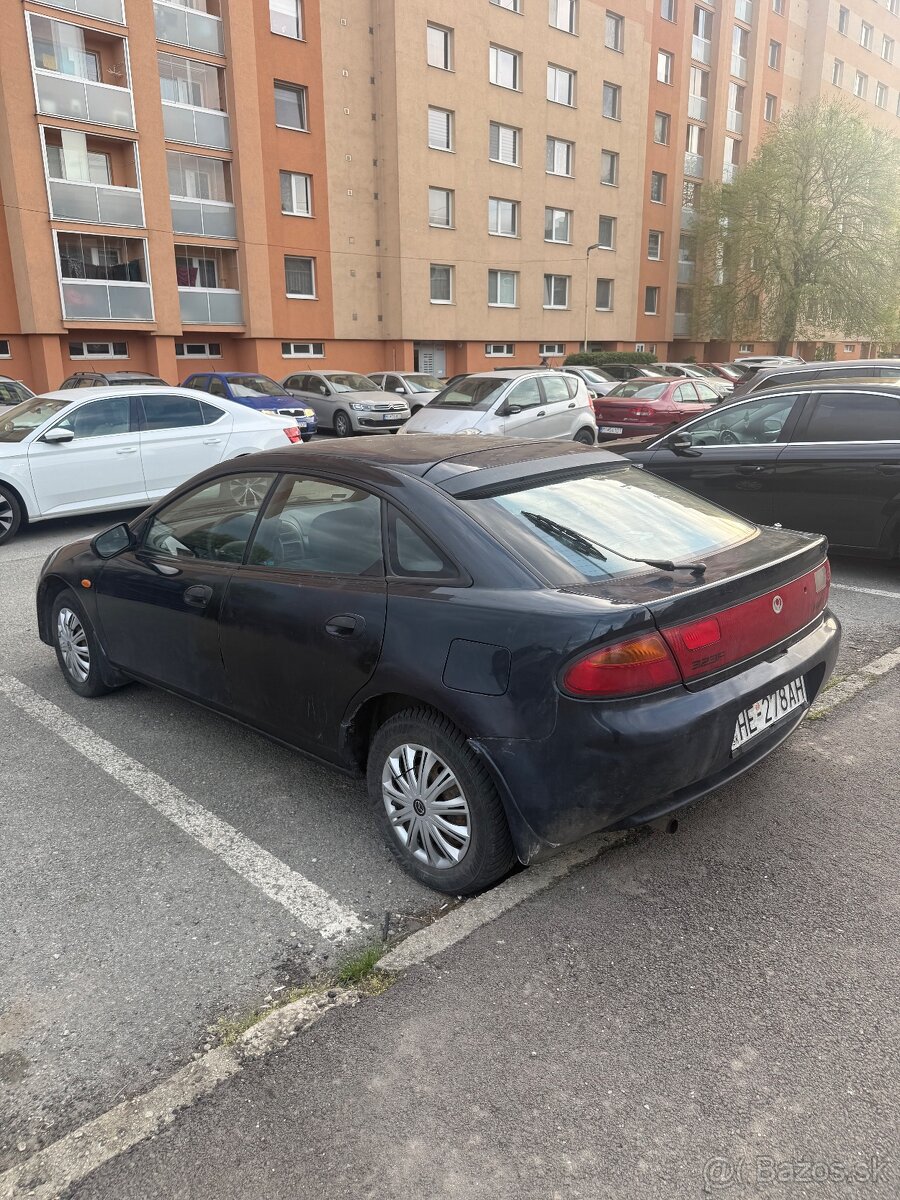 323 F 1.5 benzín - 4