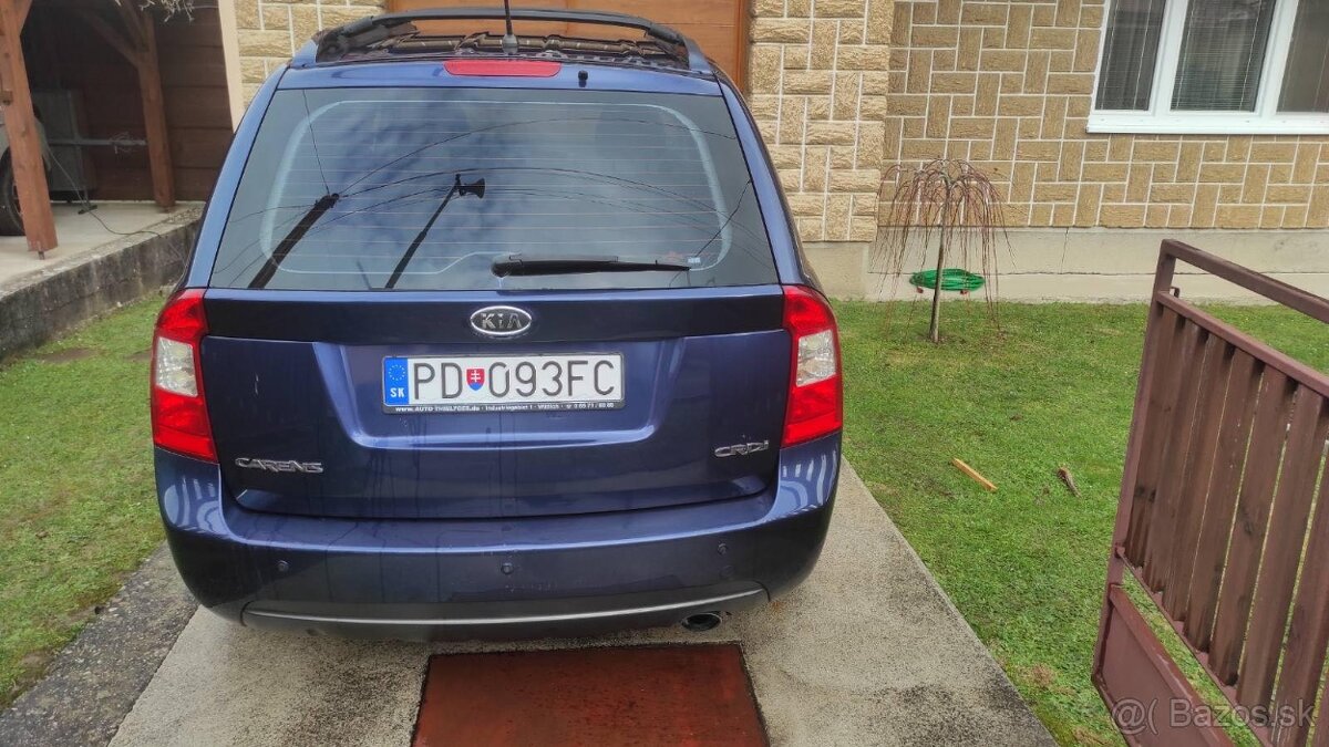Kia Carens - 4