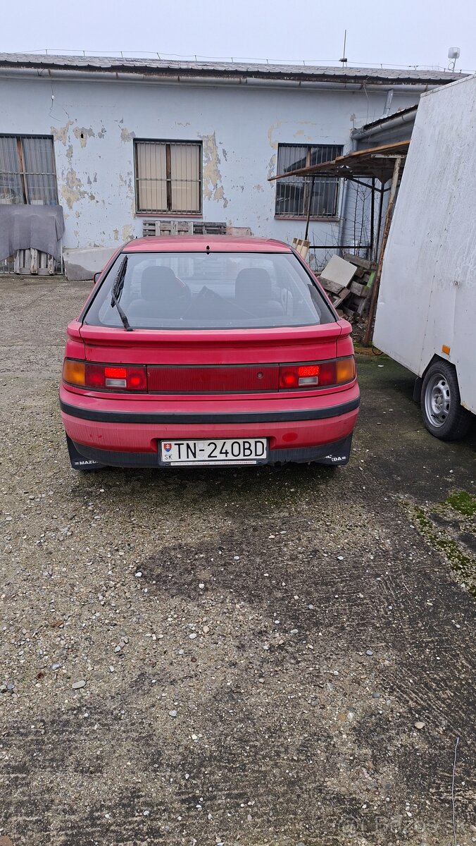 Mazda 323 f - 4