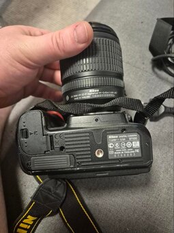Nikon D7000 + 18–55 VR + Lowepro - 4