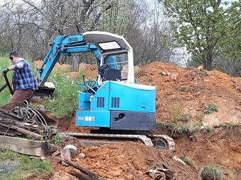 Báger Kubota - 4