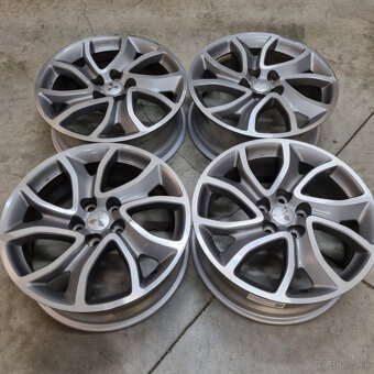 Hliníkové disky 5x114,3 R18 7J ET38 - 4