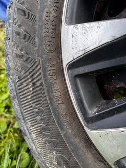 Oceľové disky R14 s puklicami a zimným pneu - 4