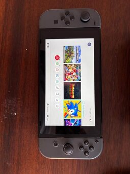 Nintendo Switch + 4 hry - 4