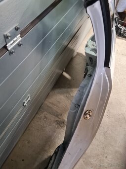 Ľavý zadný blatník Škoda Octavia 3 - 4