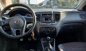 Kia rio - 4