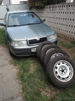 Octavia 1.6 benz 75kw - 4