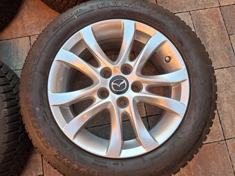 hlinikové disky org.Mazda 3---R16 - 4