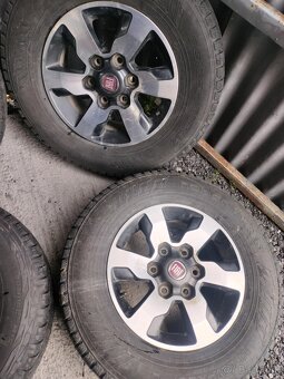 4ks alu disky orig. Fiat 6x139,7 + pneu - 4