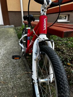 červený  bicykel woom 3 - 4