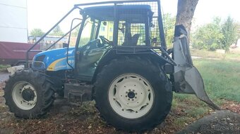 New, Holland TlA90 - 4